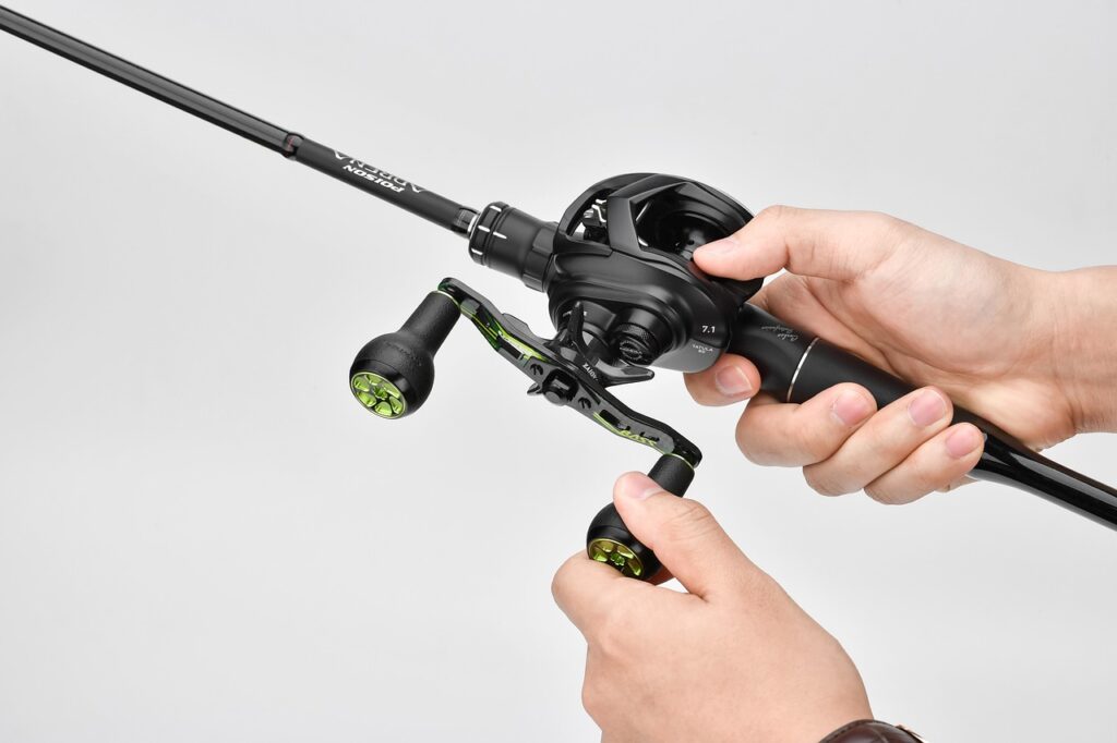 Close-up of a fishing rod with spinning reel — no anti-reverse trigger visible