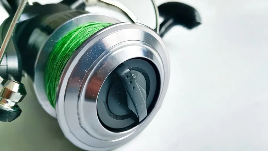 Best braided fishing line spooled on a black spinning reel for saltwater and bass fishing