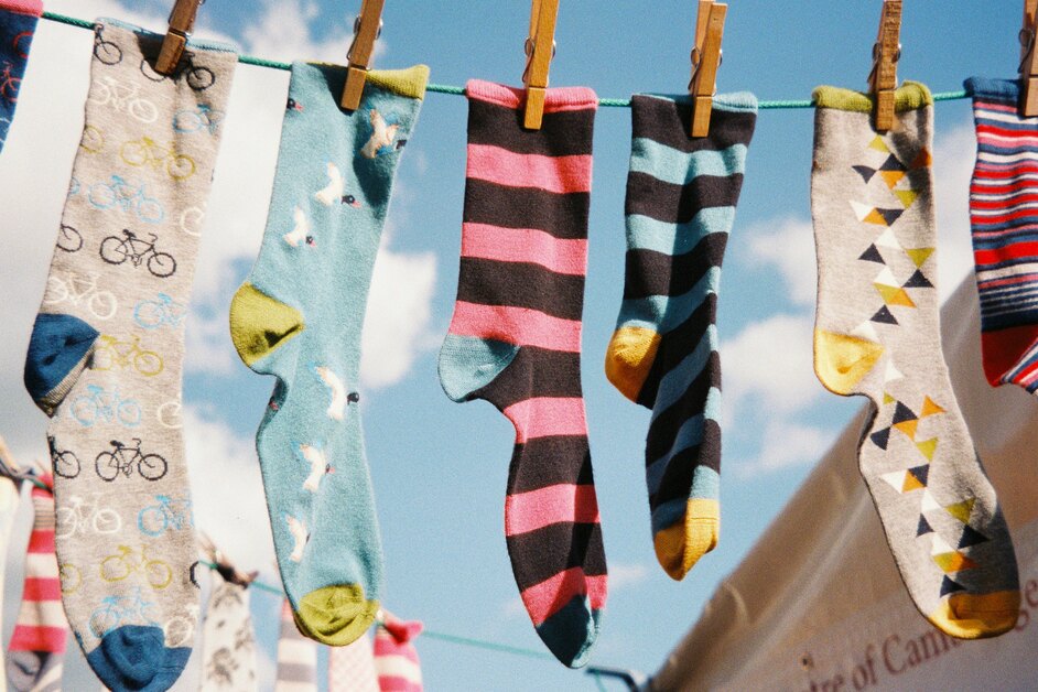 6 best socks for sweaty feet hanging on a wire to dry after outdoor use