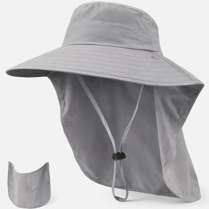 Ash gray wide-brim sun protection hat with detachable neck flap, ventilation perforations, and adjustable chin strap, 3/4 studio view.